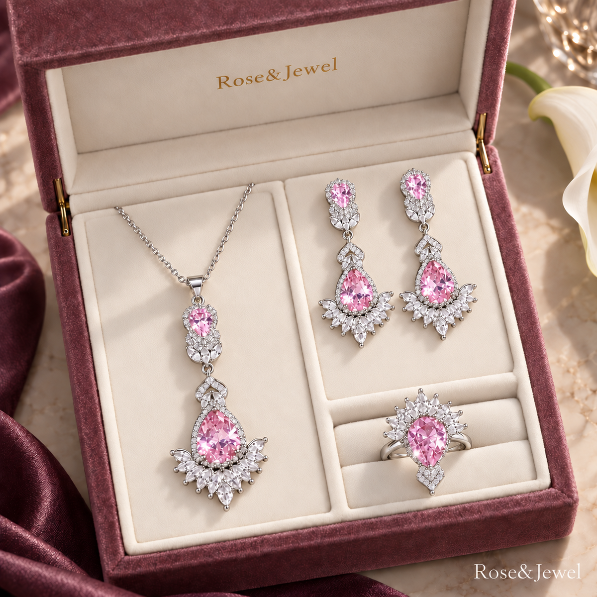 Pink Regalia jewelry set in a rose velvet box with natural silver-tone details